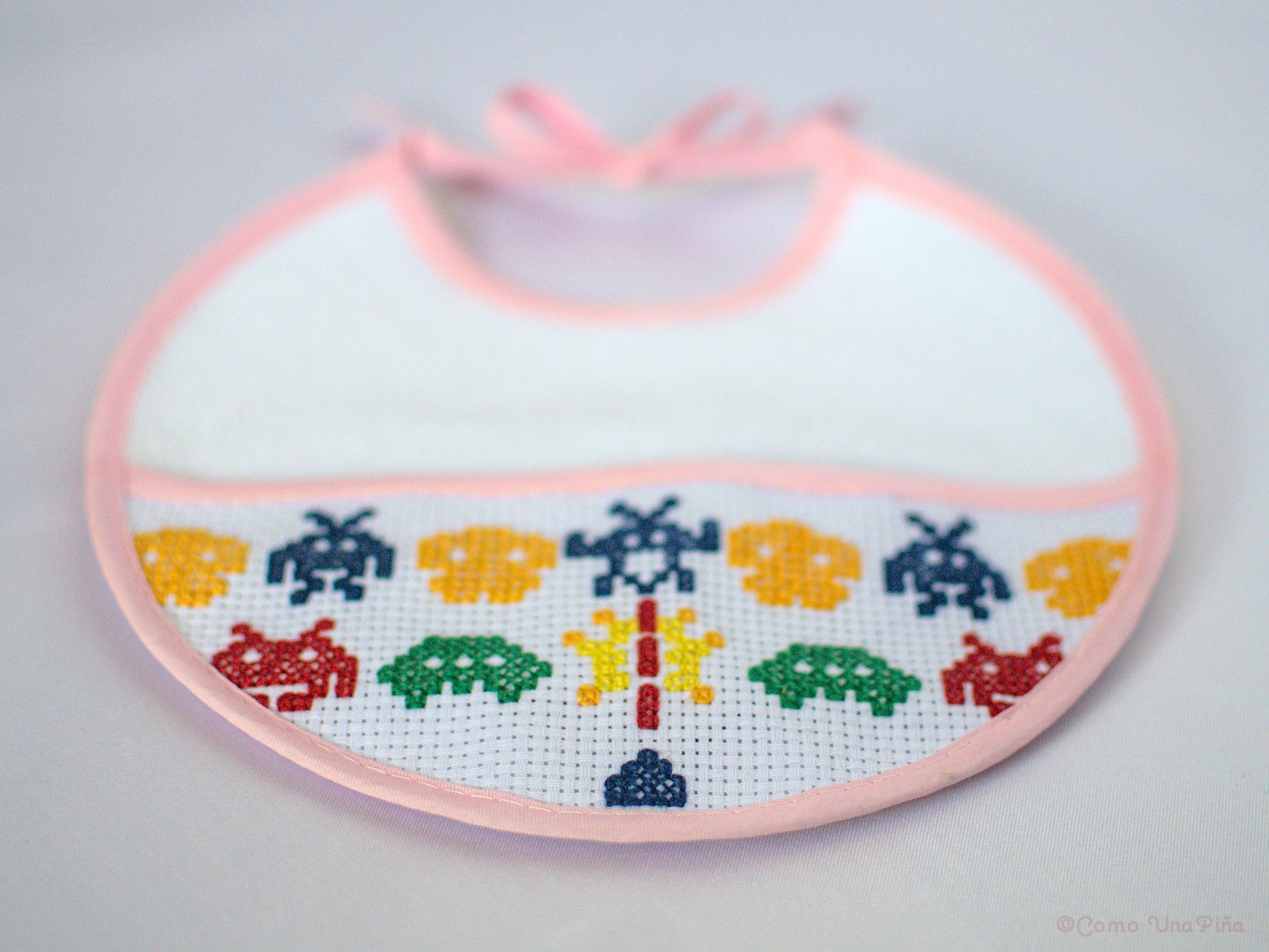 Space invaders cross stitch bib